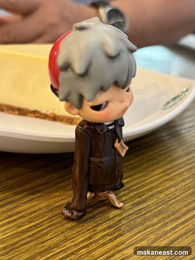 Figurine with Cheesecake