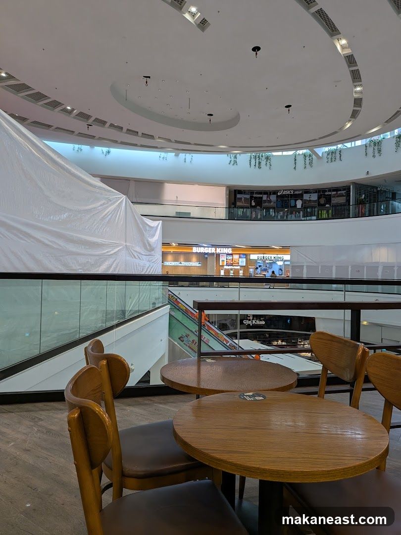 Indoor seating area overlooking a mall