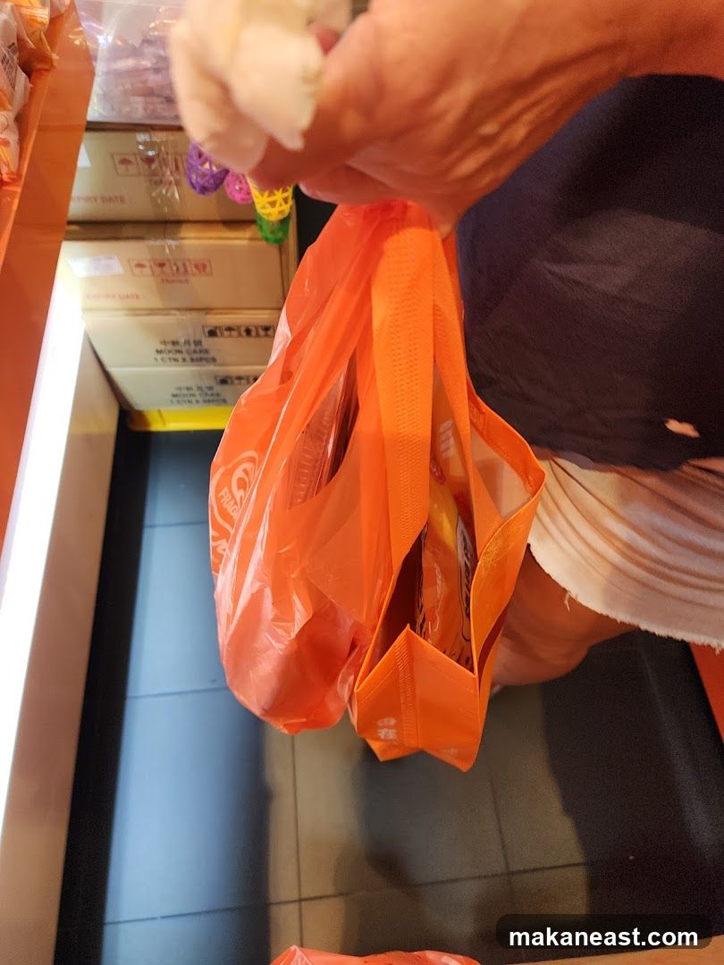 Person holding shopping bags