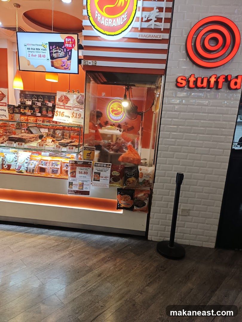 Food stall with various snacks and promotions