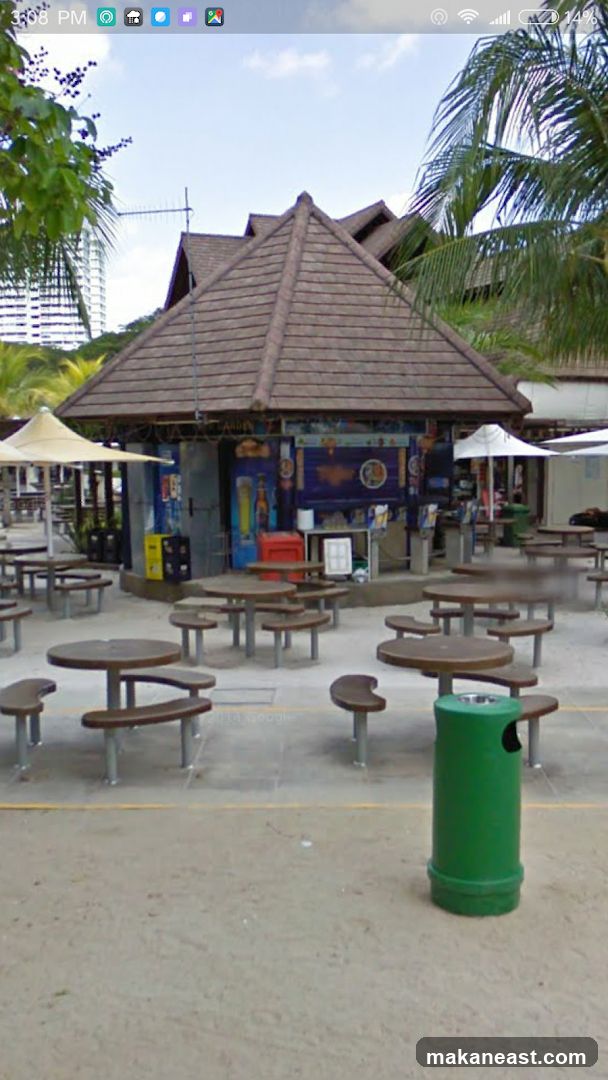 Outdoor seating area with a small kiosk