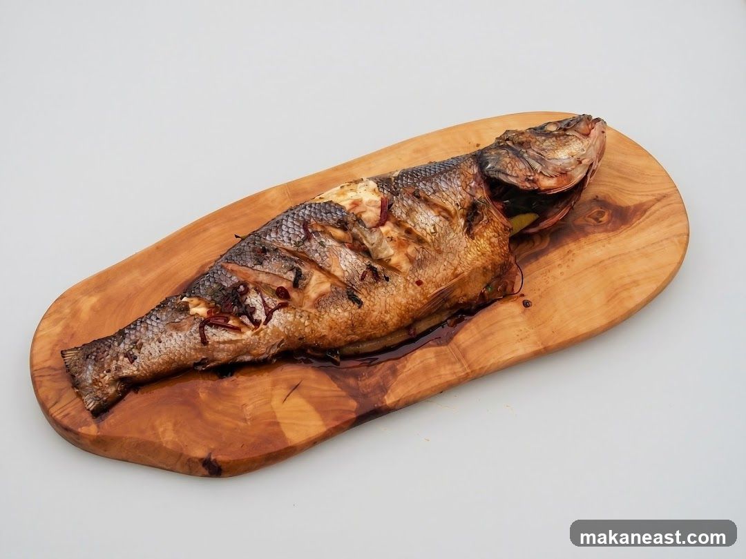 Whole Roasted Fish on a Wooden Platter