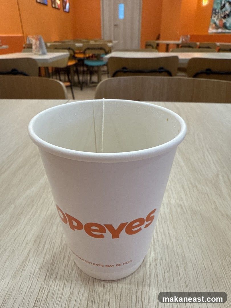 Popeyes cup on table