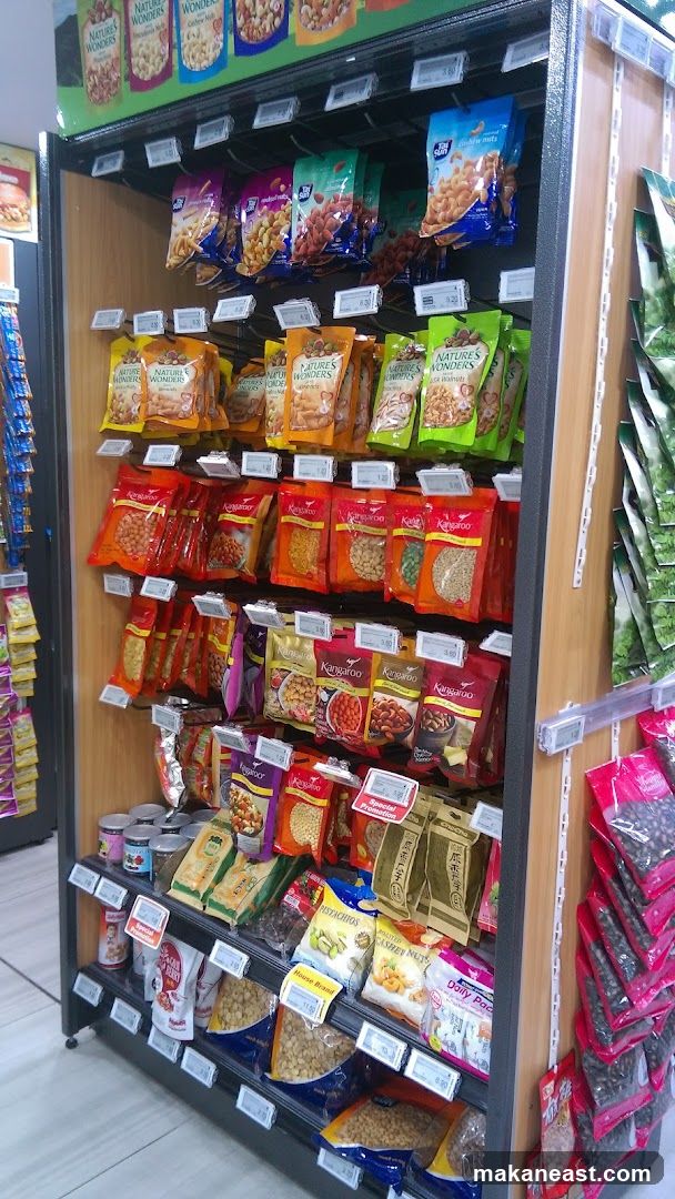 Assortment of Packaged Nuts and Snacks