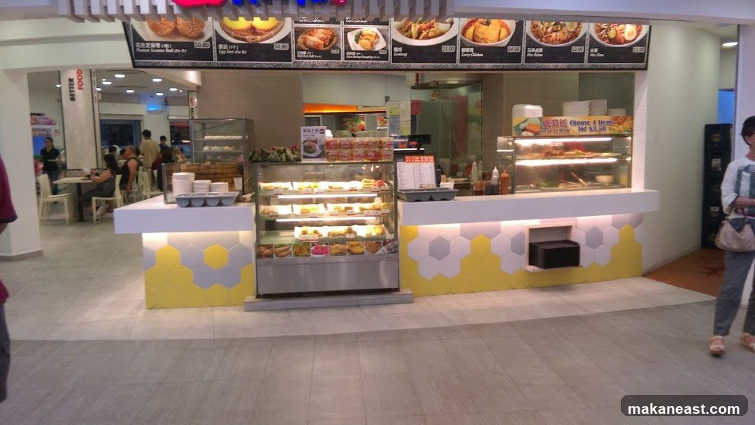Food stall with display cases and menu board