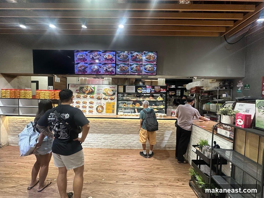 Food stall interior with customers