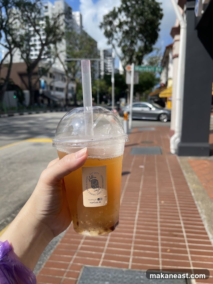 Hand holding a bubble tea drink