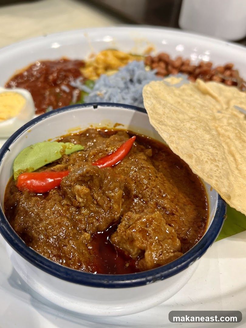 Nasi Kerabu with Beef Rendang