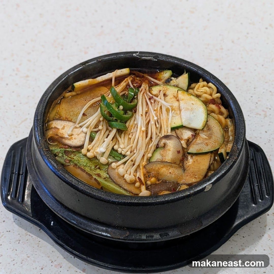 Spicy Noodle Soup with Mushrooms and Zucchini