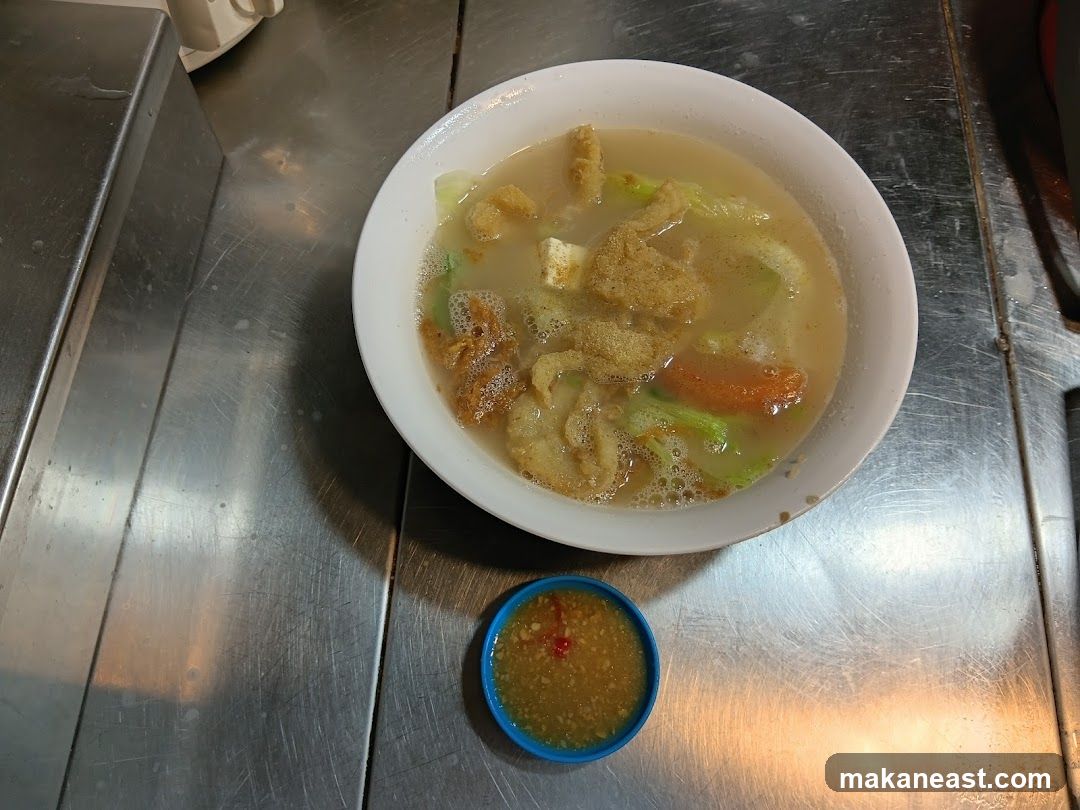 Bowl of Soup with Dipping Sauce