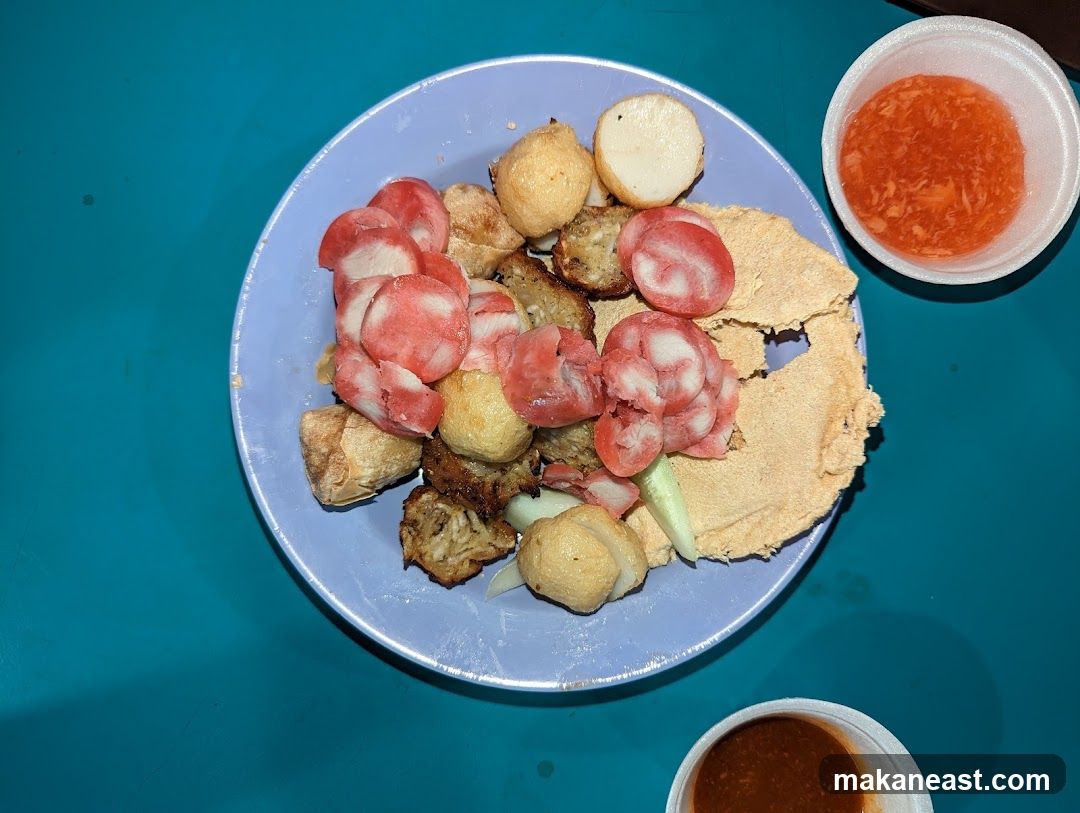 Plate of food with dipping sauces
