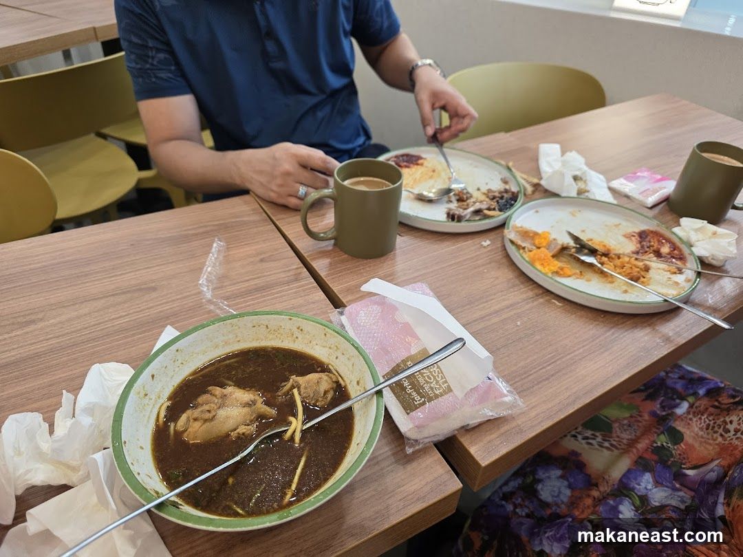 Diners at a table with leftover food