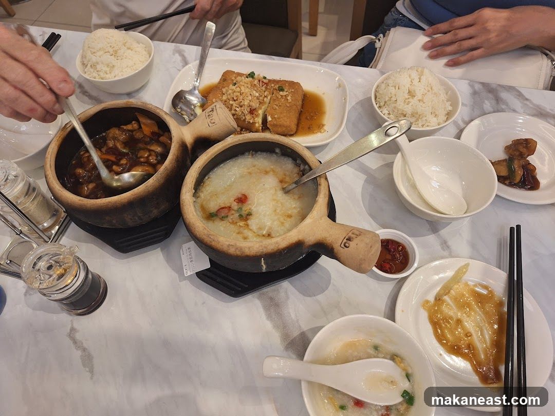 Table with various dishes and rice