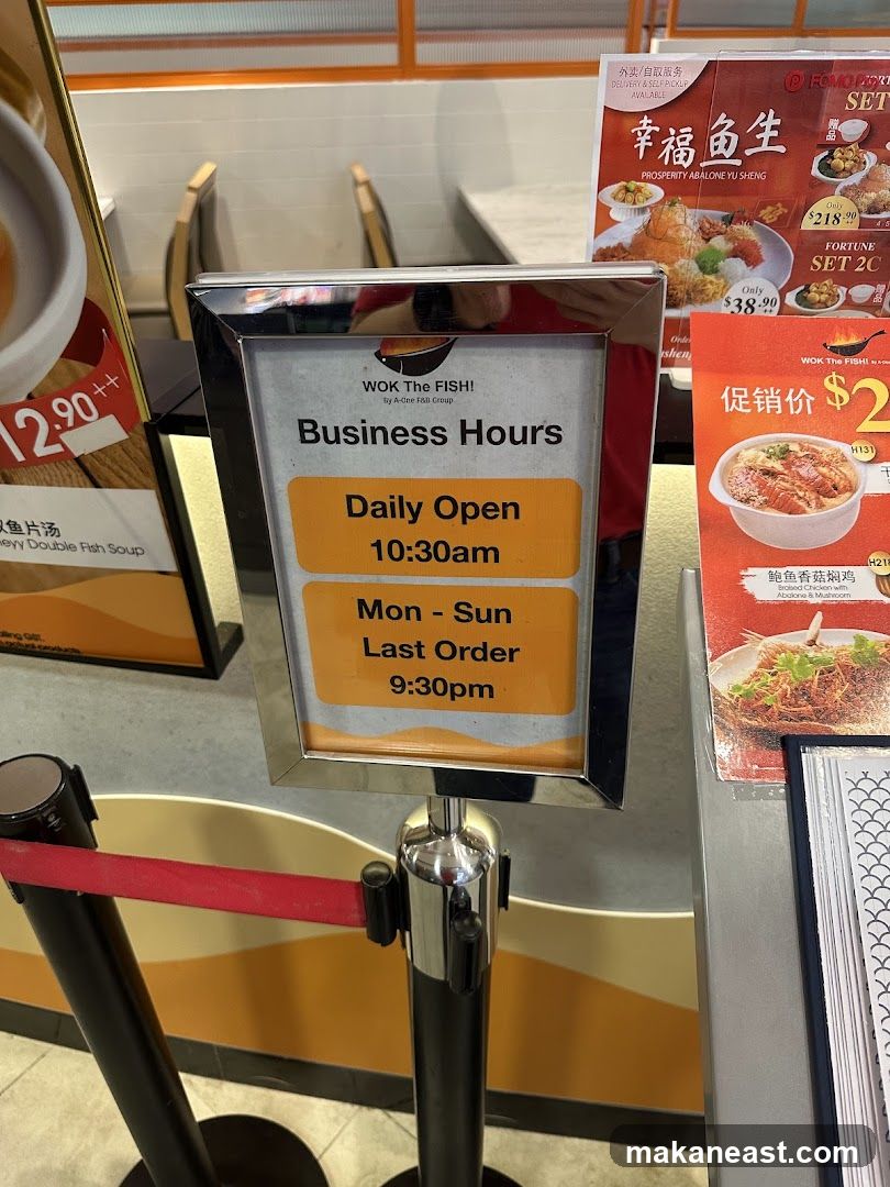 WOK The FISH! Business Hours Sign