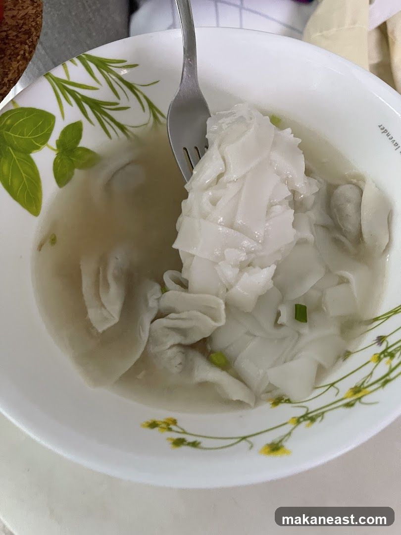 Noodles and Dumplings in Broth