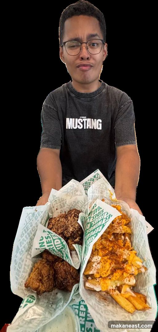 Man holding a platter of food