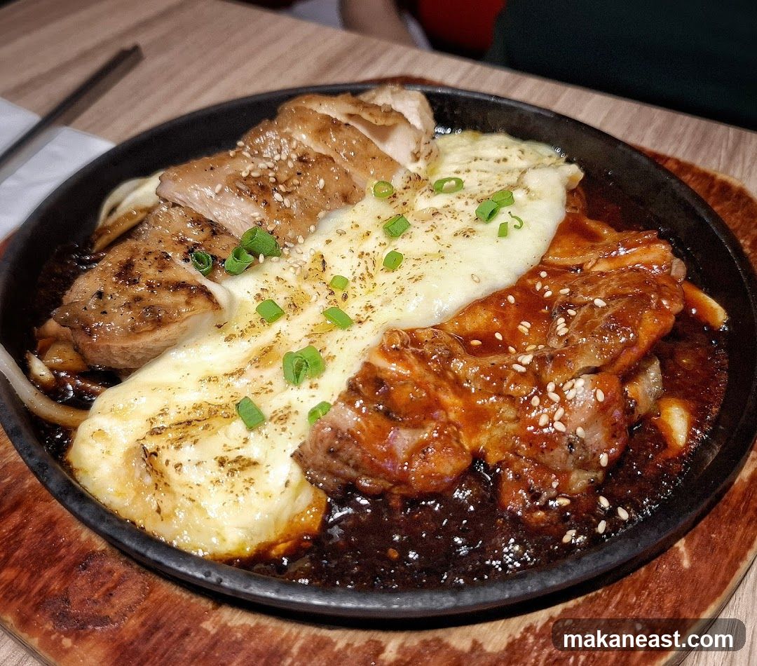Sizzling Platter with Meat and Cheese