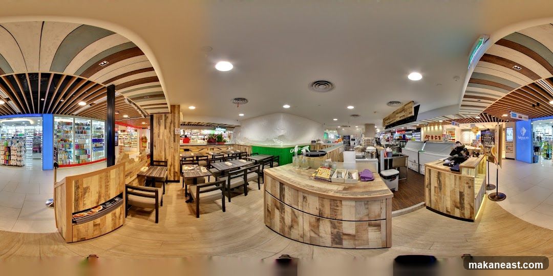 Interior of a retail space with a cafe area