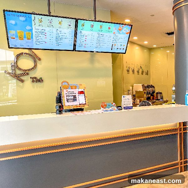 Counter with digital menus and promotional displays