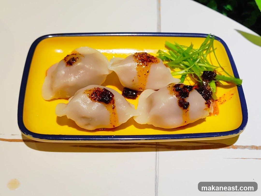 Dumplings with Chili Oil and Scallions