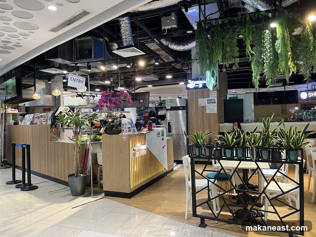 Restaurant Counter with Plants and Seating