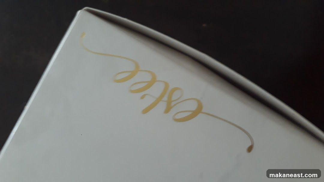 Box with script lettering