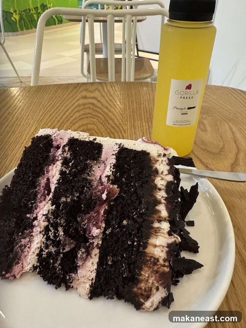 Slice of Chocolate Cake and Pineapple Juice