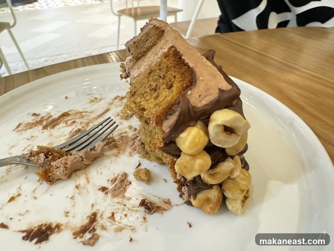 Partially Eaten Hazelnut Chocolate Cake