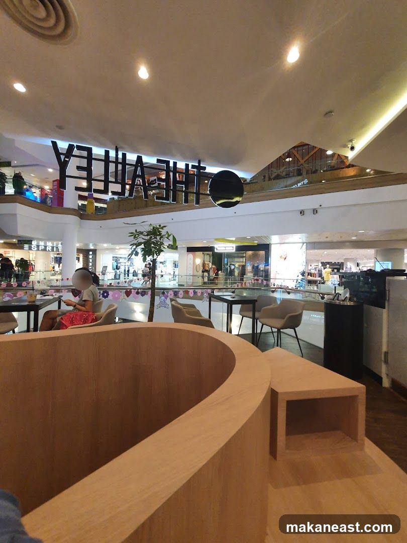Interior of a shopping mall with a cafe