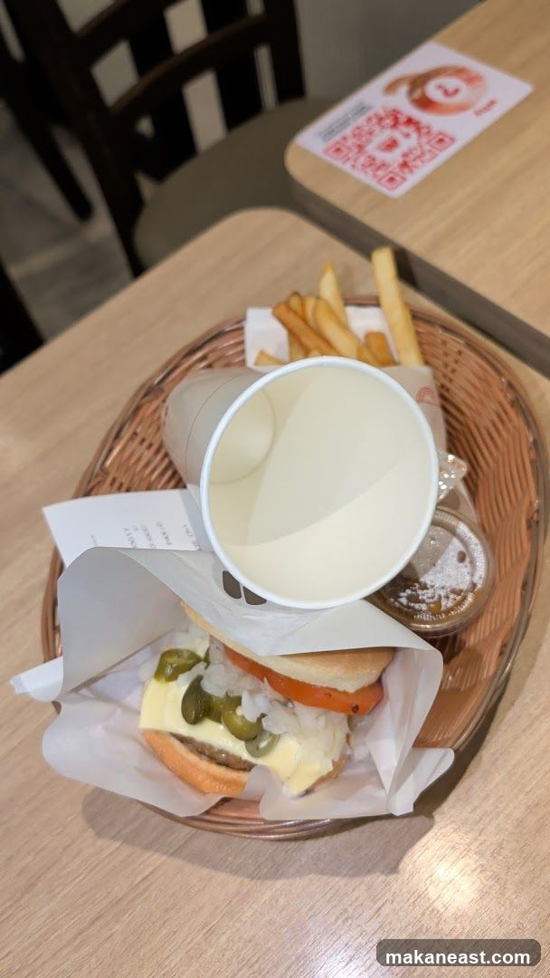 Burger meal with fries and drink cup