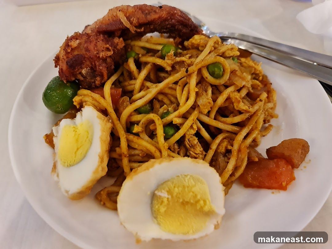 Noodle Dish with Fried Chicken and Egg