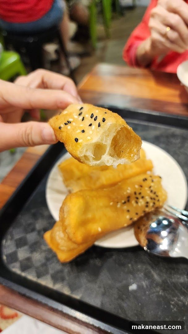 Fried Dough Sticks with Sesame Seeds