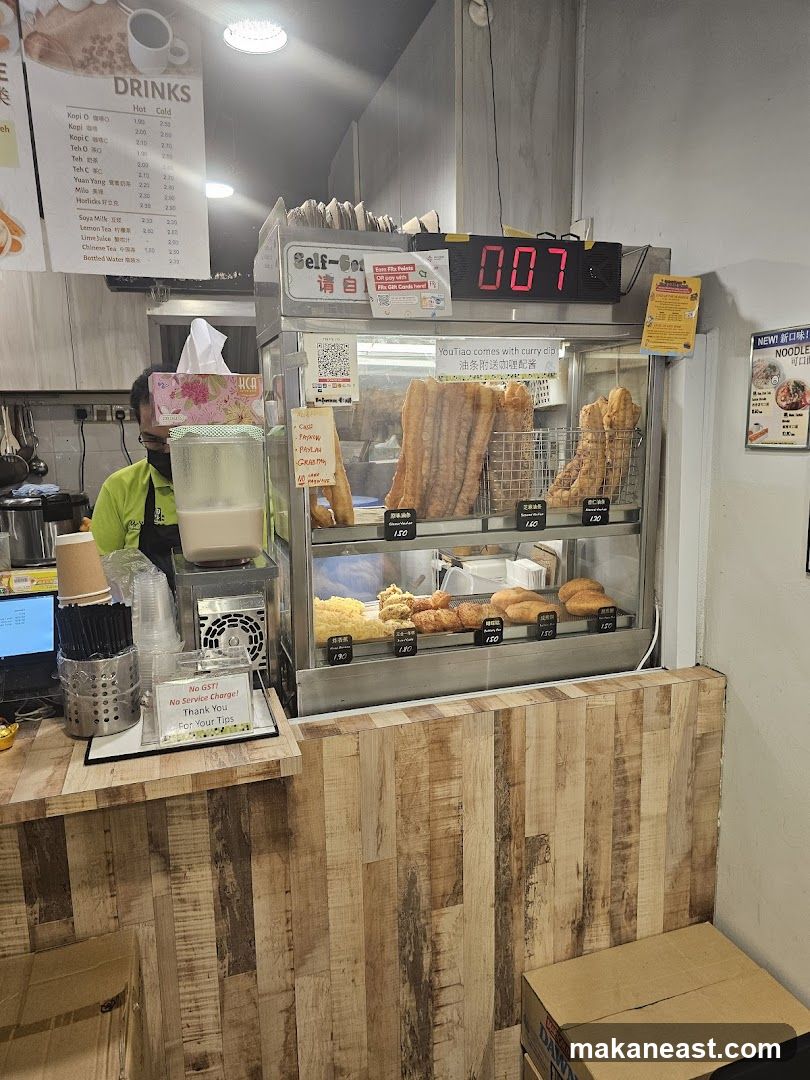 Self-service counter with food display