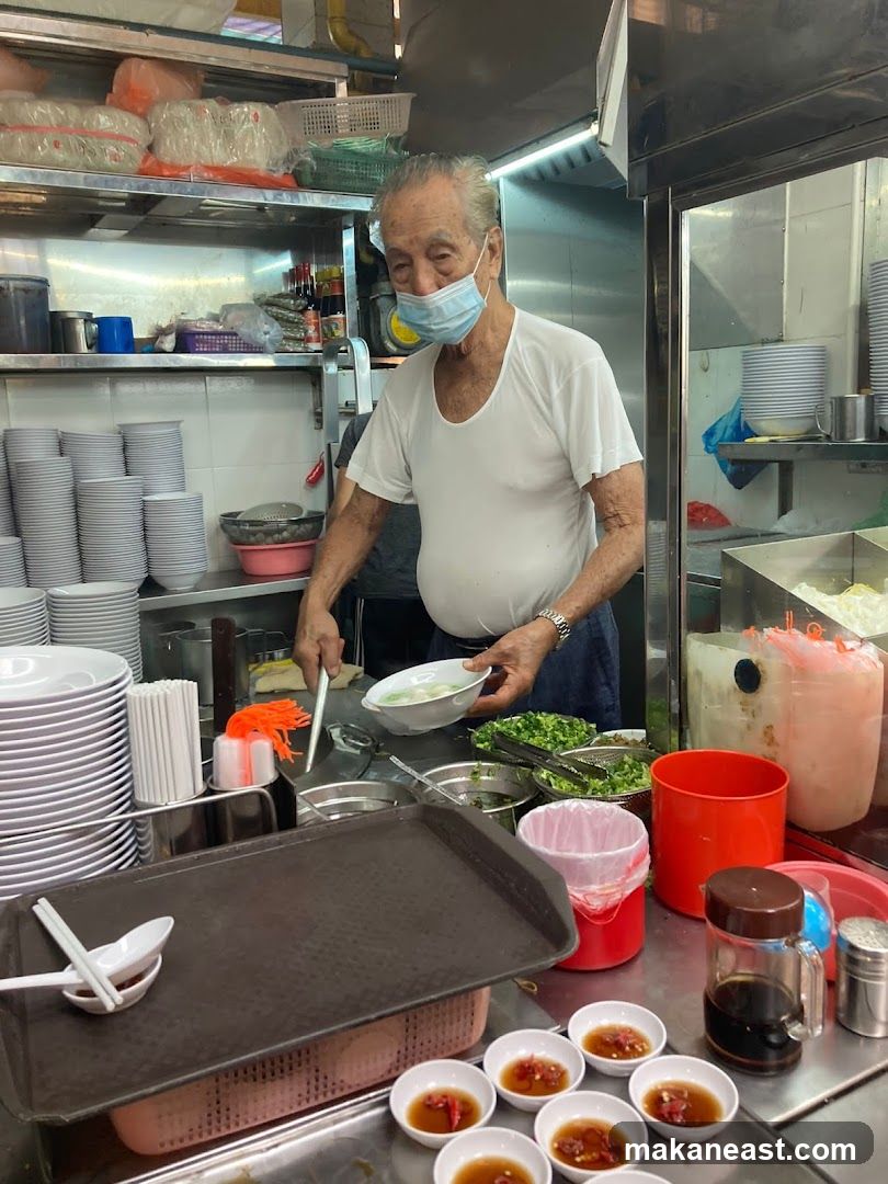 Elderly Man Preparing Food