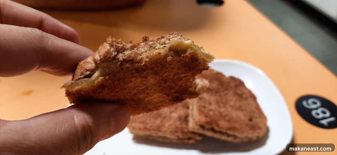Close-up of a bite taken from a sandwich