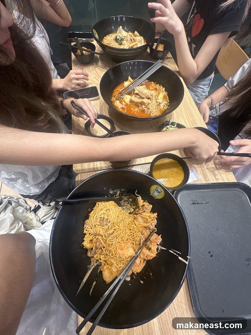 People eating noodles