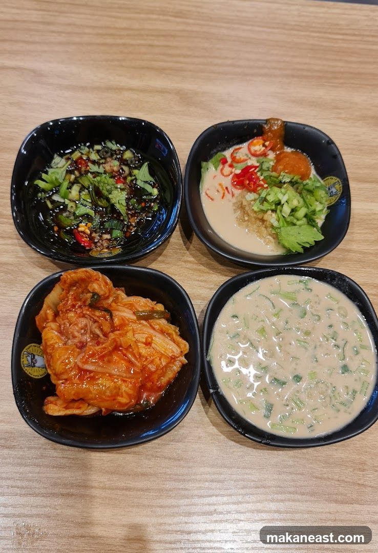 Four Small Bowls of Food