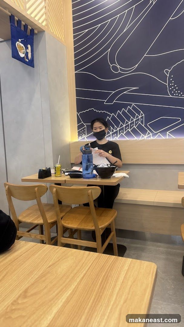 Restaurant Interior with Person at Table