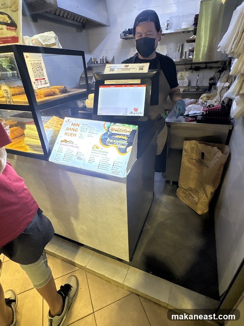Counter with food display and staff