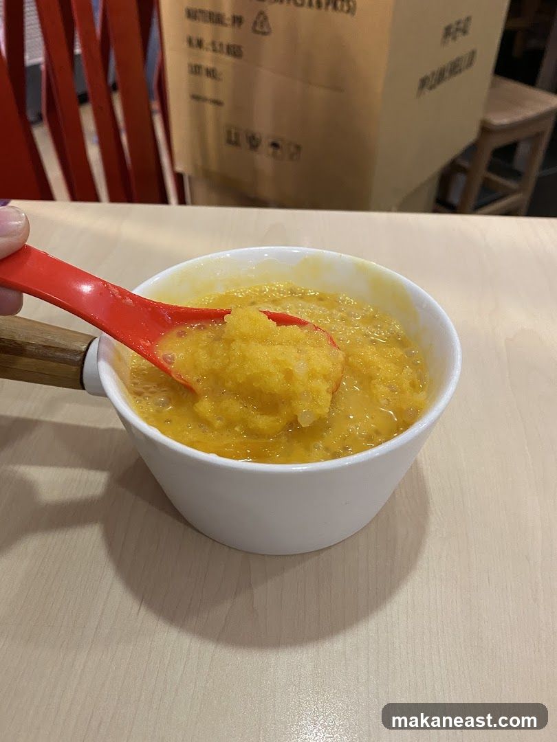 Mango dessert with spoon