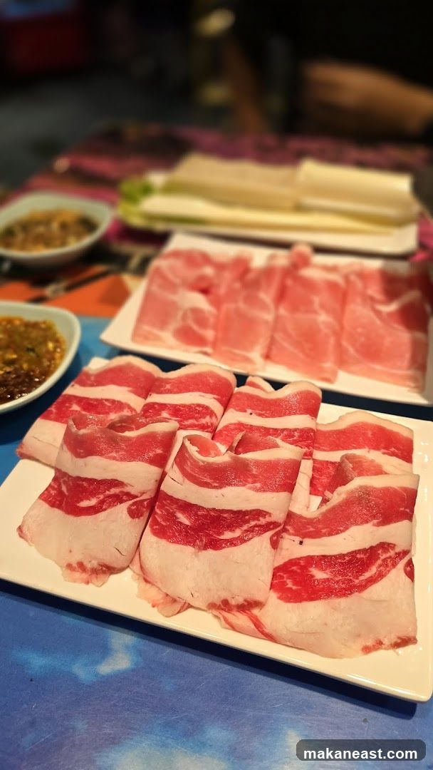 Thinly Sliced Raw Meat and Dipping Sauce