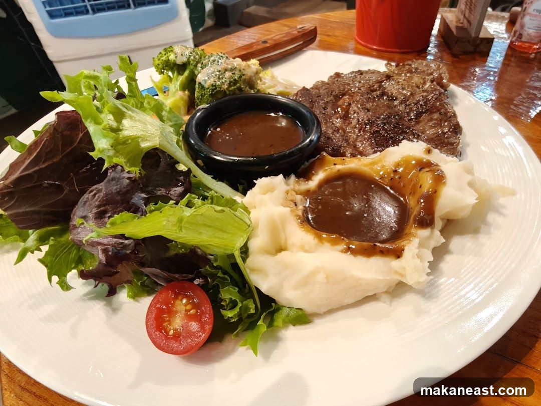 Steak with Mashed Potatoes and Salad