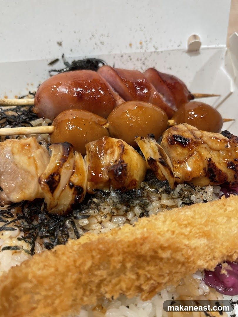 Bento Box with Skewers and Fried Food