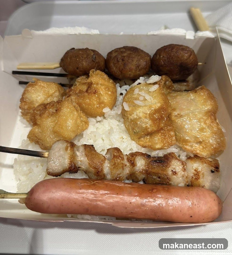 Bento Box with Skewers and Sausage