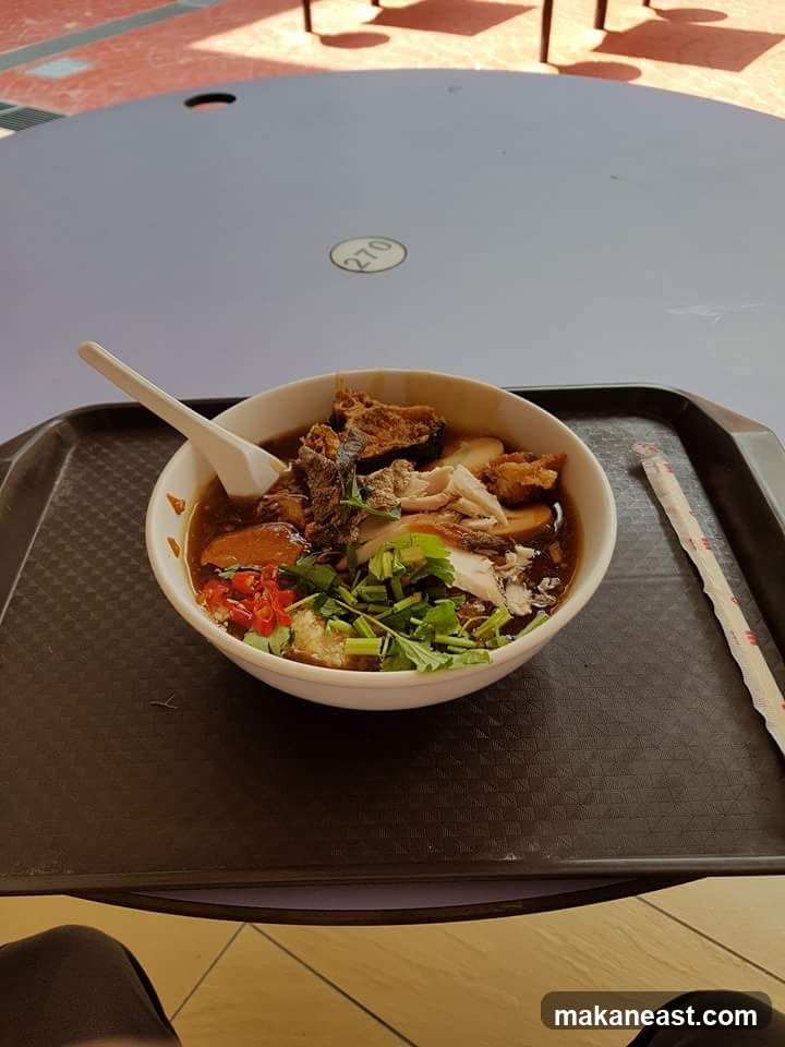 Bowl of noodles with meat and vegetables