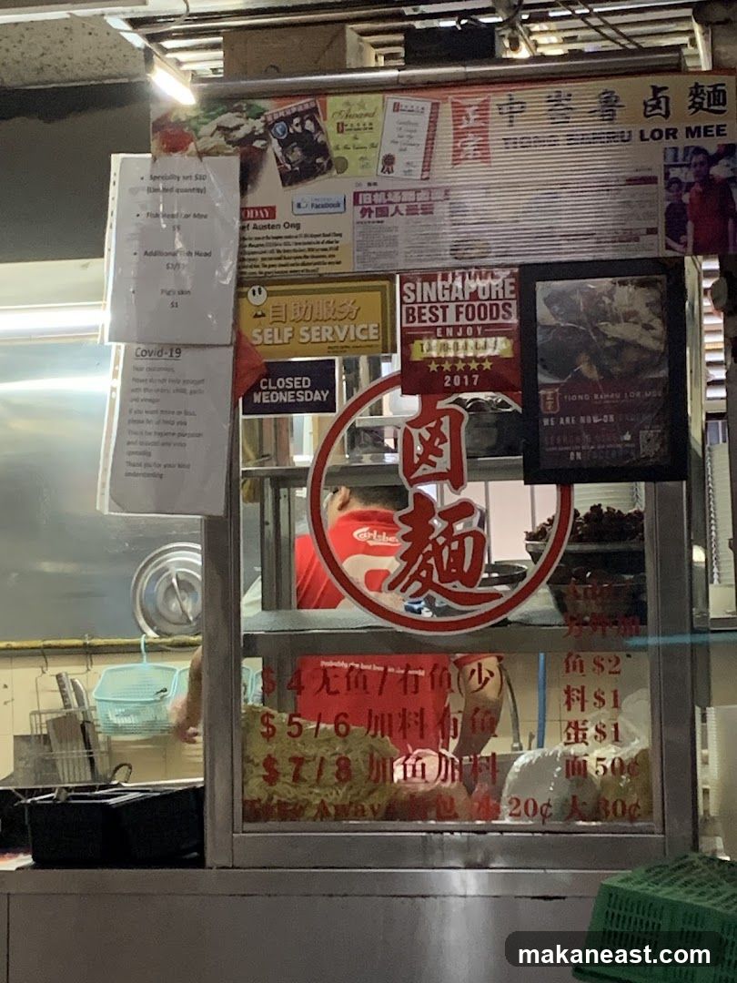 Food stall with menu and signage