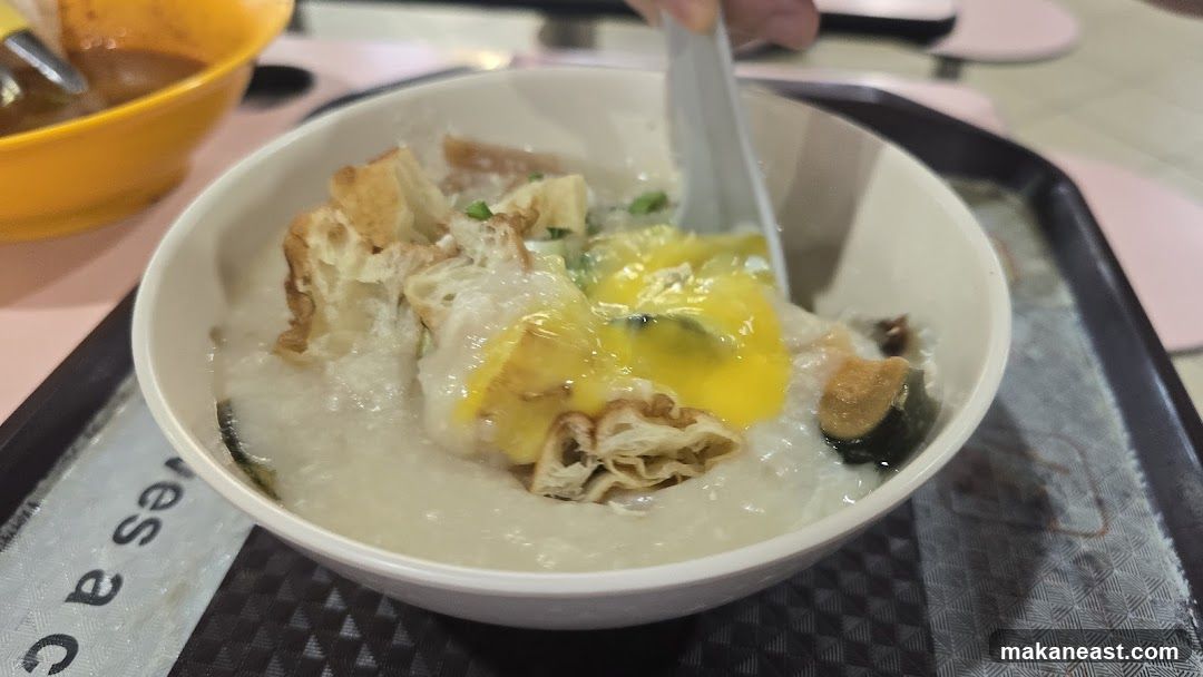 Congee with Egg and Fried Dough Sticks