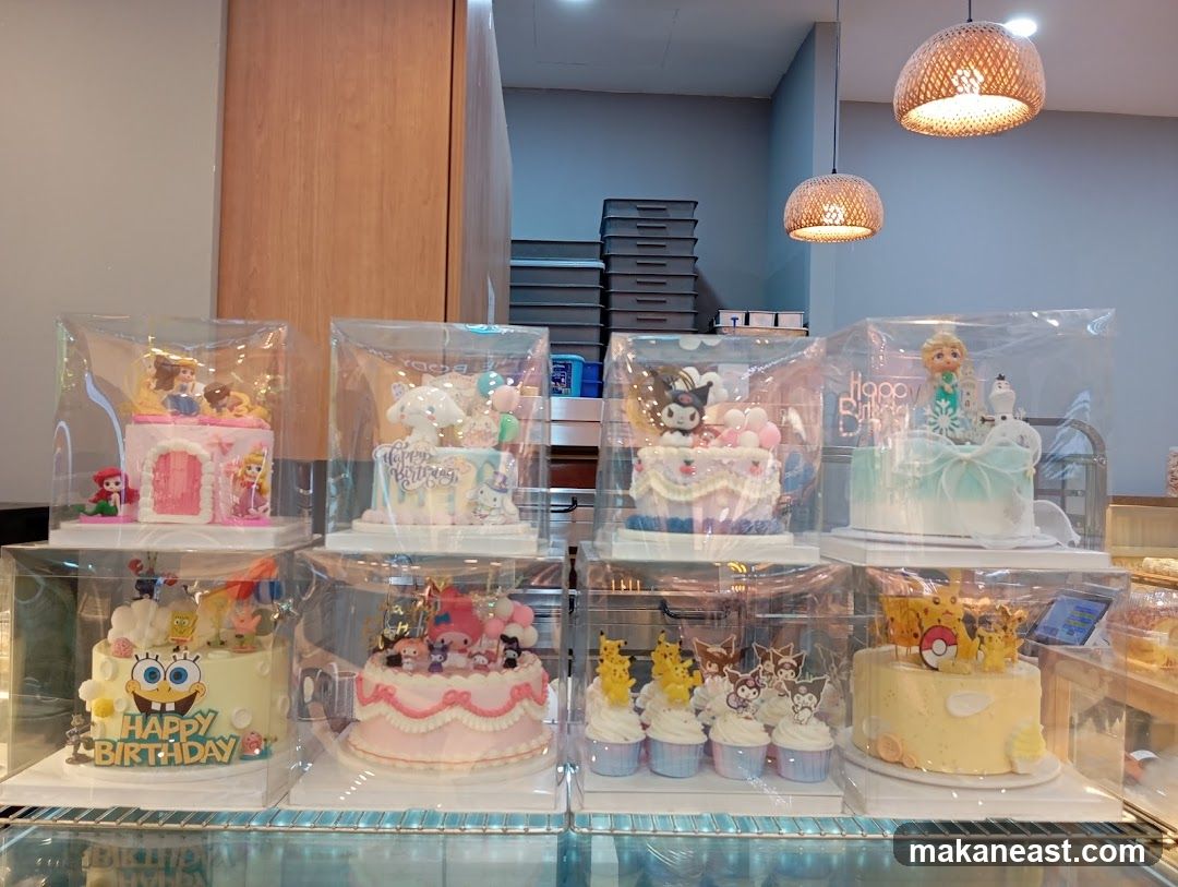 Assortment of Decorated Cakes and Cupcakes