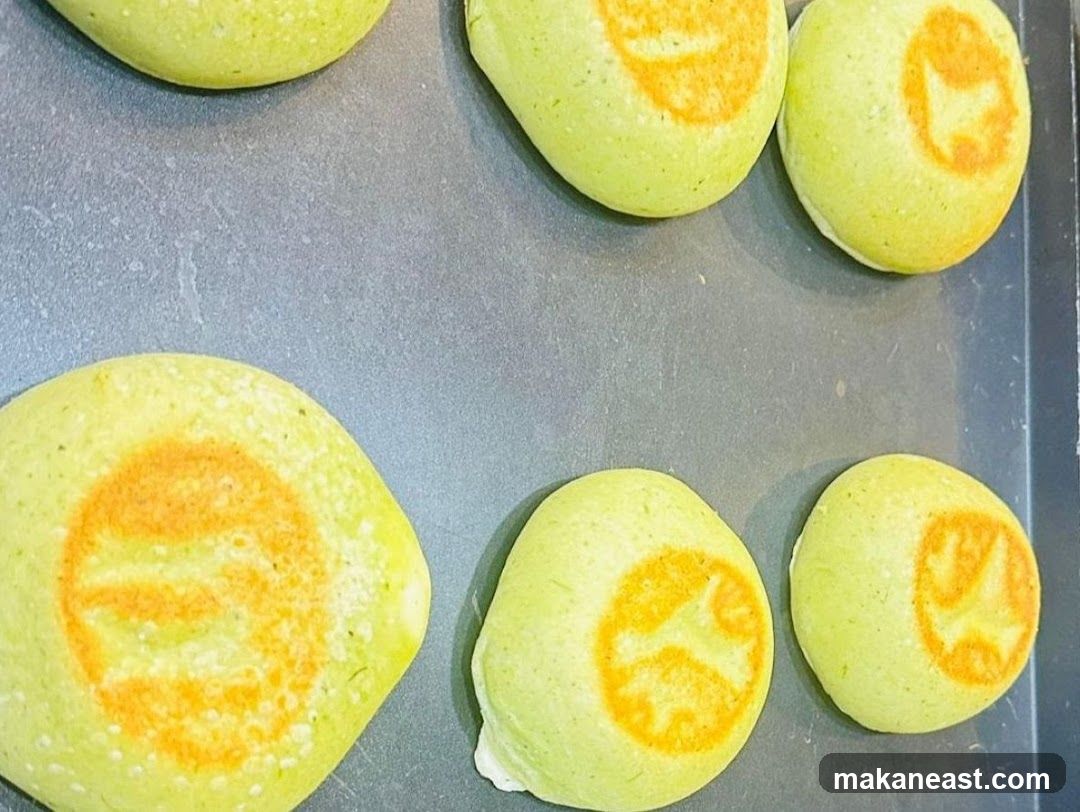 Green Buns with Orange Designs