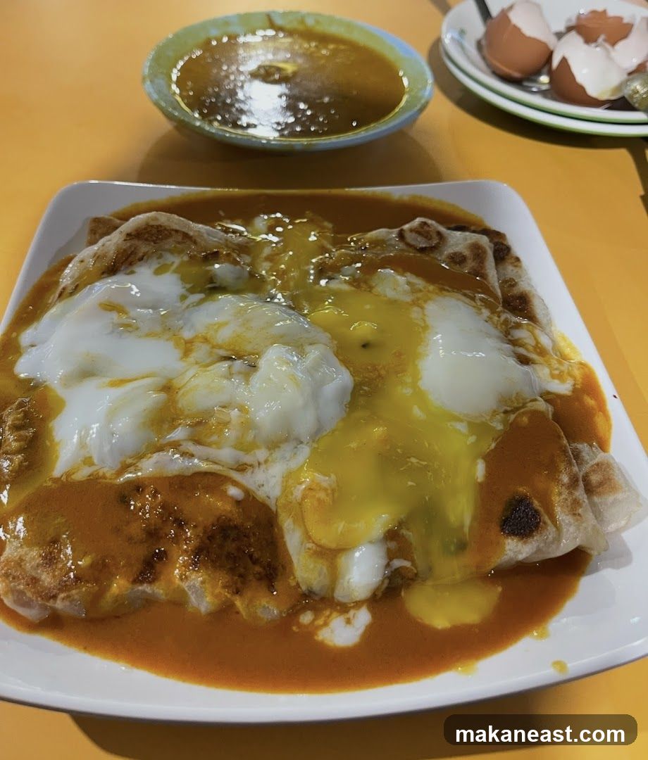 Roti Canai with Curry and Eggs